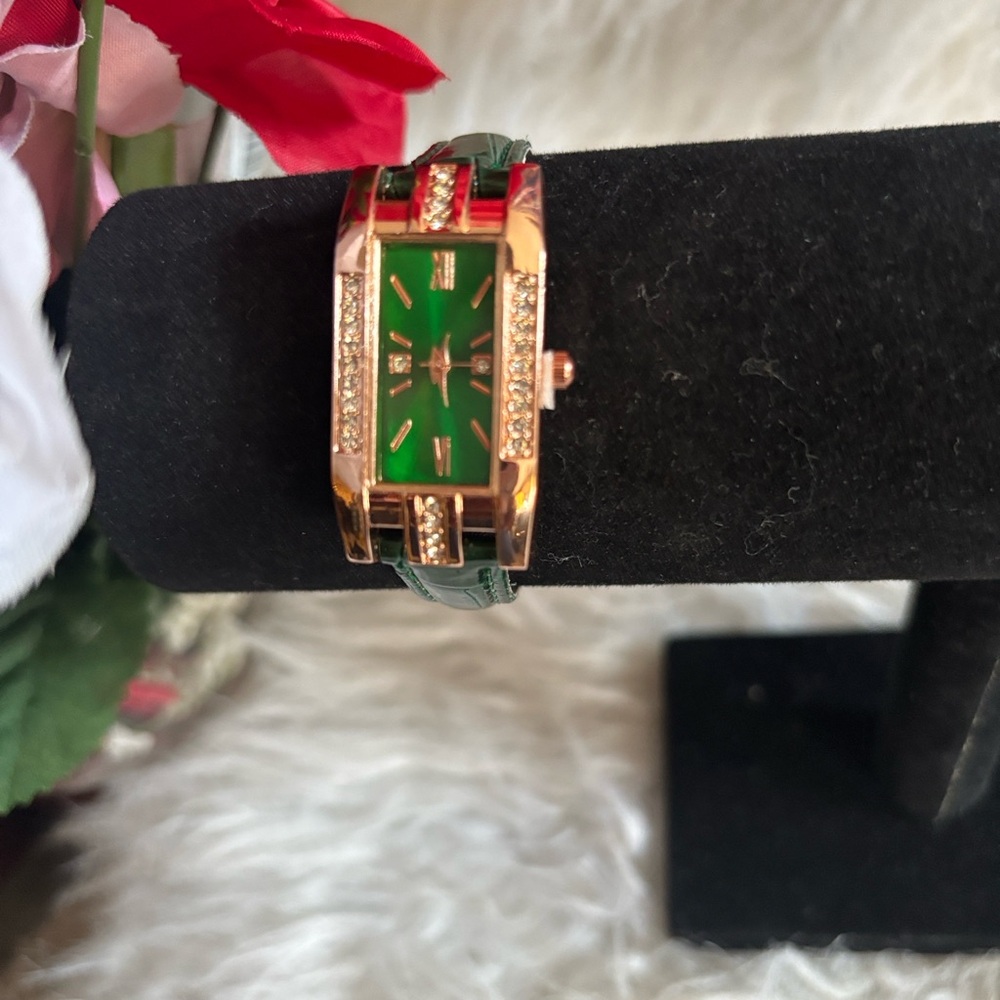 Elegant Women's Green and Gold Watch